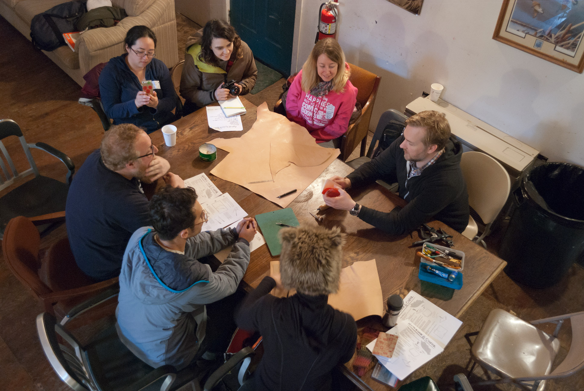 Jeremy Spake leading a workshop on making your own leather journal-holders.