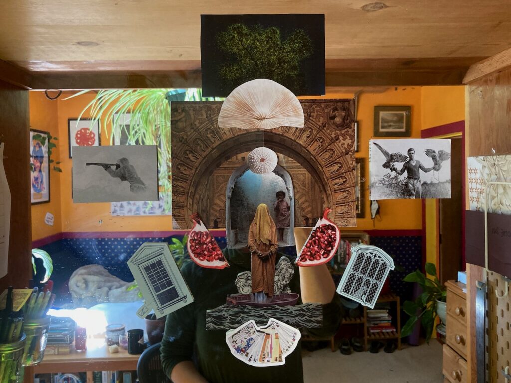 A collage on a mirror in Lucy's room. There's a veiled woman at the center, surrounded by other imagery. Two halves of a pomegranate. A boat. A seashell.